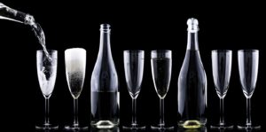 Anagram Events Australia - see our amazing feedback - stock image of sparkling wine being poured into wine glasses